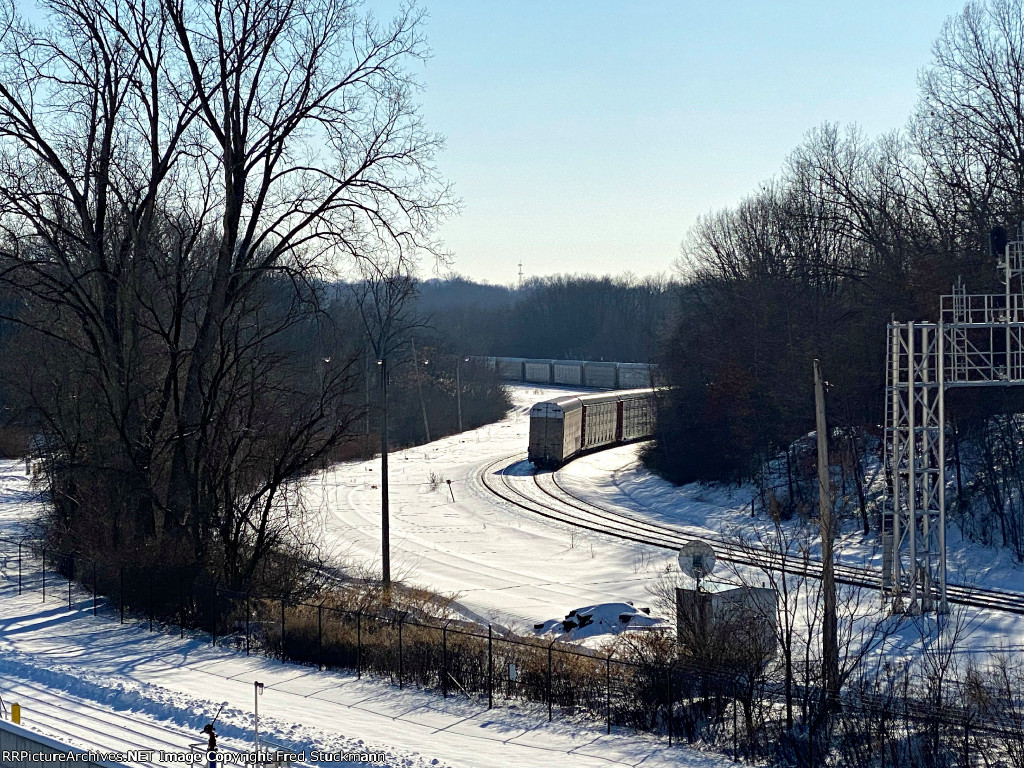 Westbound autoracks clear BD tower.